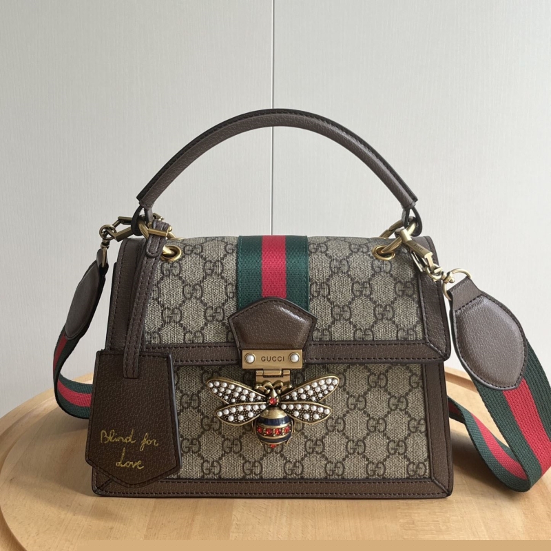 G*u*i top handle bags